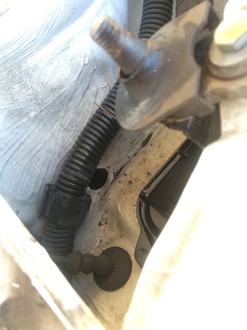 Wet Floor... Rain tray grommet ? Take a look VW Vortex Volkswagen Forum